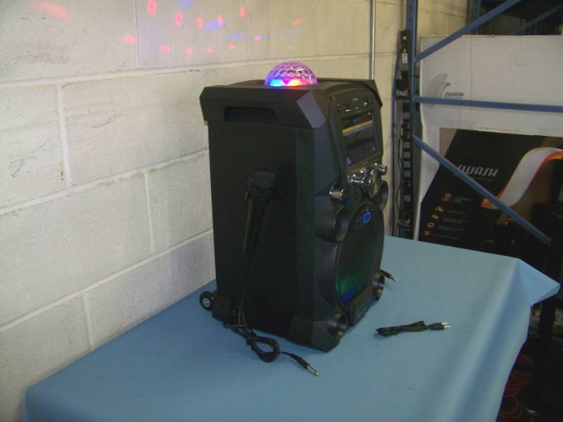 lot 3 image: Singing Machine, Portable LoudspeakerSpeaker, Professional HD Karaoke System with Wireless Bluetooth, (2) Microphones, Disco Ball Light Effect and Front Display Lighting