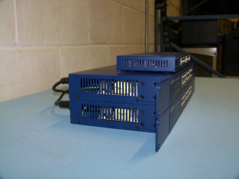lot 85 image: (3) Netgear, ProSafe, Fast Ethernet Switches