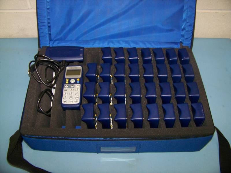 lot 77 image: (32) SMART, Interactive Audience Response PE System Units in Soft-Sided Carrying Case