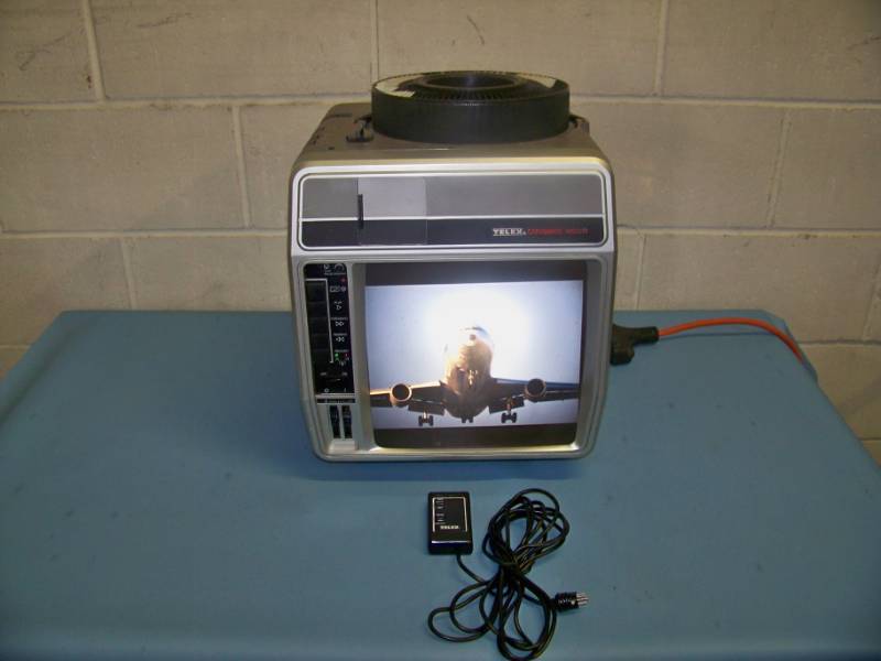 lot 95 image: Telex, CaraMate 4000, 35mm Carousel Slide Projector and Viewer with Remote Control and Cassette Audio Deck in Hard-Sided Carrying Case