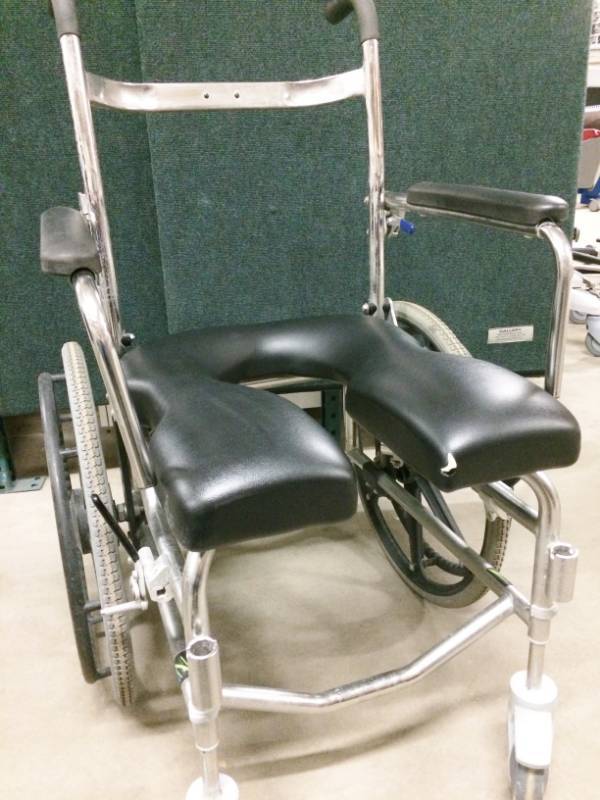 lot 11 image: MSRP $1300 Raz Design Inc AP Self-propel Rehab Shower Commode Chair - Great Working Condition - Missing Back & Footrests