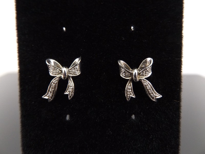 .925 Sterling Silver Diamond Accented Bow Earrings