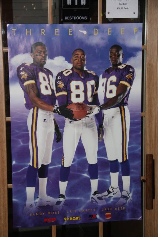 Minnesota Vikings - Cris Carter and Randy Moss on the sidelines during a  game in 1999.