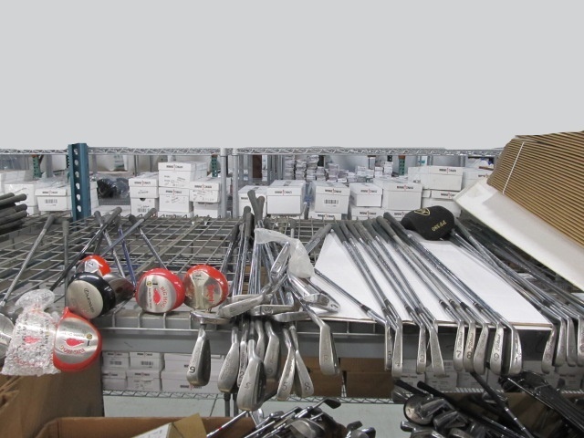 lot 25 image: Contents of Shelf - Titleist Irons etc