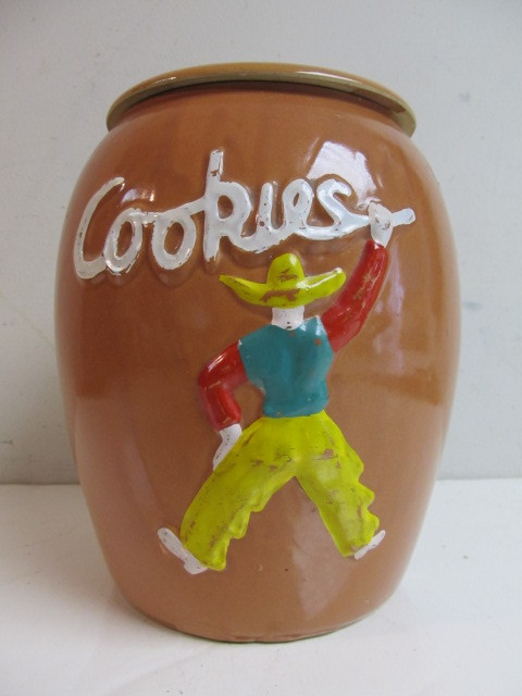 lot 110 image: Vintage Embossed Stoneware Cowboy Cookie Jar