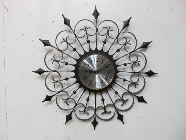 lot 180 image: Mid Century Modern Starburst Style Metal Wall Clock