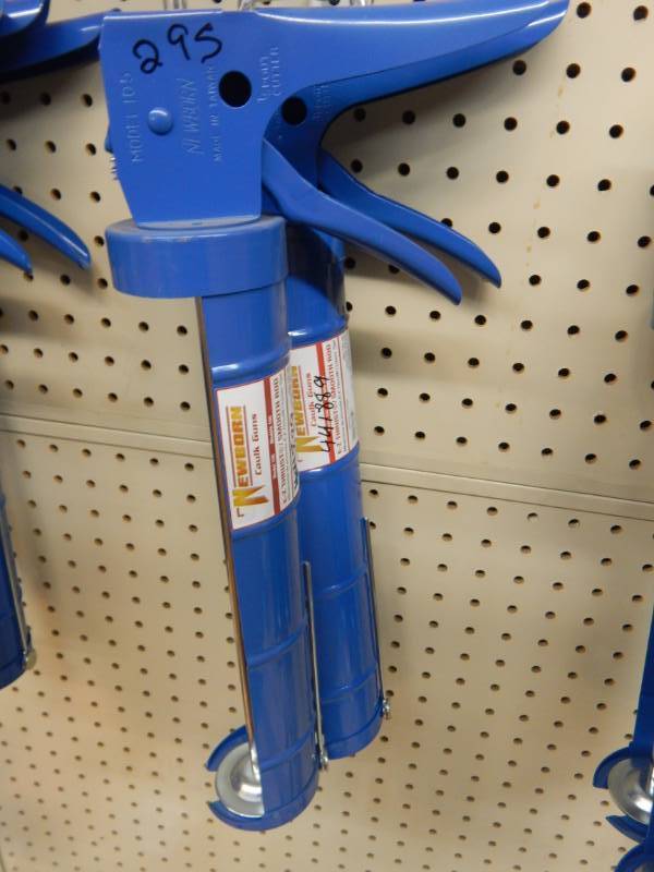lot 295 image: 29 ounce caulk guns