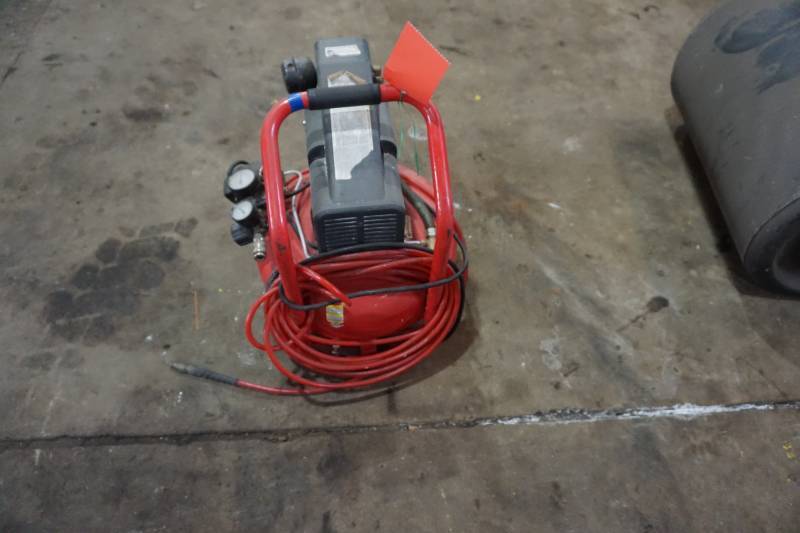 lot 28 image: Husky Brand 150 PSI 6 Gallon Pancake Style Air Compressor