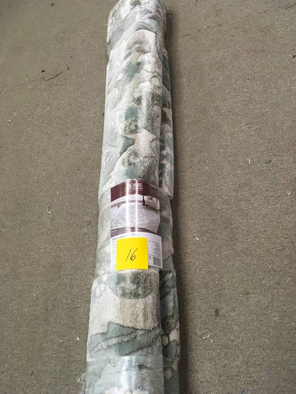 lot 16 image: Home Decorators Collection Sherrington Blue 5 ft. 3 in. x 7 ft. Area Rug not used