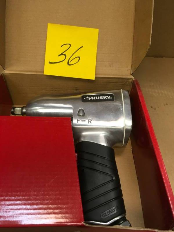 lot 36 image: Husky 12 in. 300 ft. lbs. Impact Wrench  in good condition