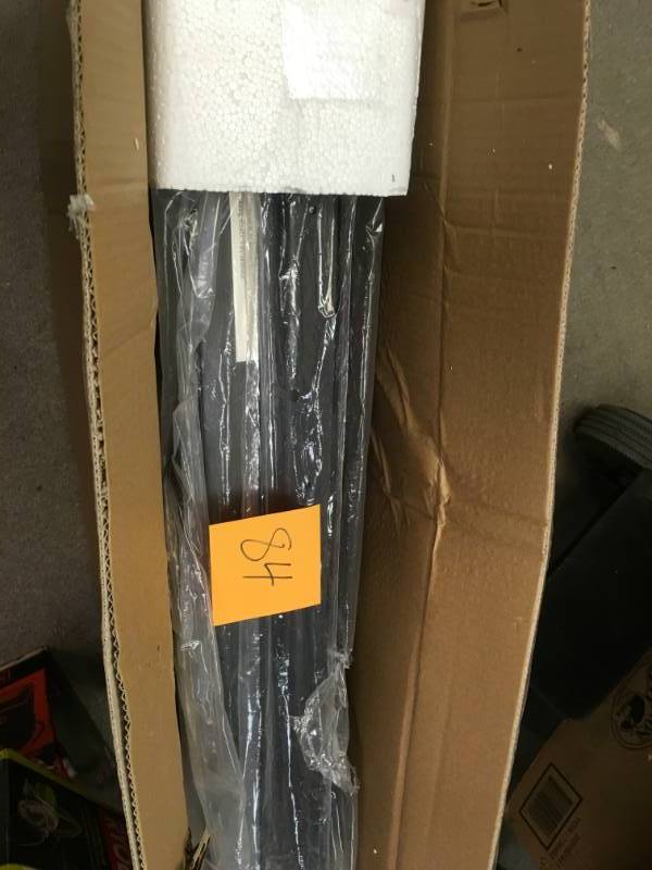 lot 84 image: AKDY 36 in. Wall Mount Electric Fireplace Heater in Black with Tempered Glass, Pebbles, Logs and Remote Control in good condition