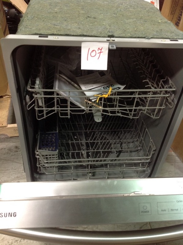 Samsung 24 in. Top Control Dishwasher with Stainless Steel Interior Door and Plastic Tall Tub in Stainless Steel, 55 dBA dent on side not used see pictures