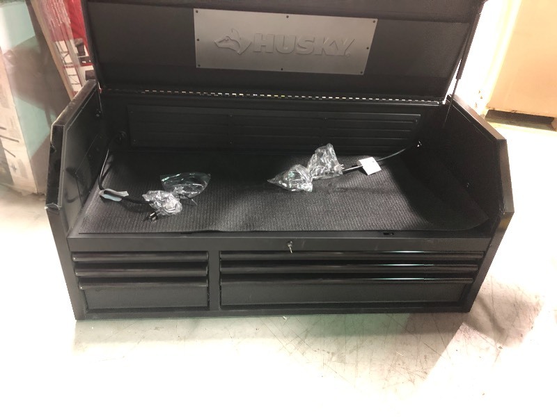 lot 116 image: Husky Industrial 52 in. W x 21.2 in. D 6-Drawer Top Tool Chest in Textured Black in decent conditions whit small damage  on the cornerds