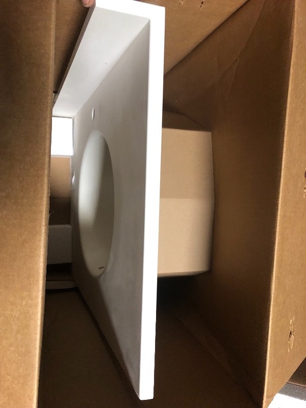 lot 122 image: Swan Ellipse 31 in. W x 22 in. D Solid Surface Vanity Top with Sink in White in good conditions