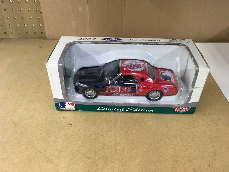 lot 297 image: Minnesota Twins 2002 Ford Thunderbird