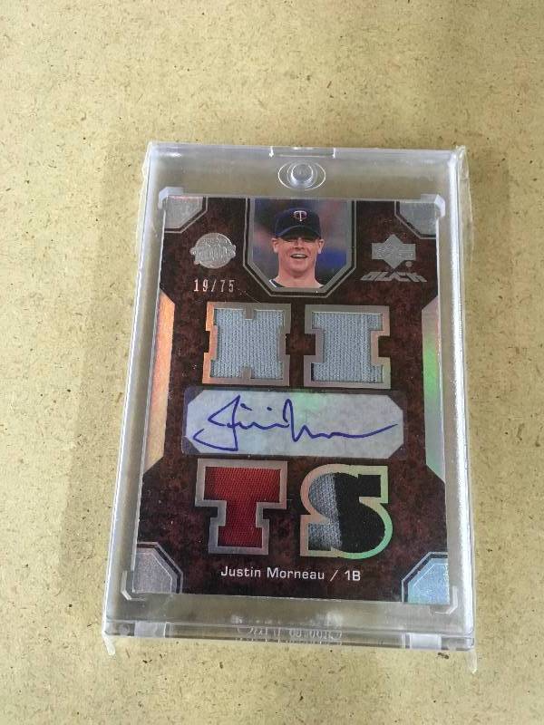 lot 301 image: Justin Morneau Game Used Autographed Card