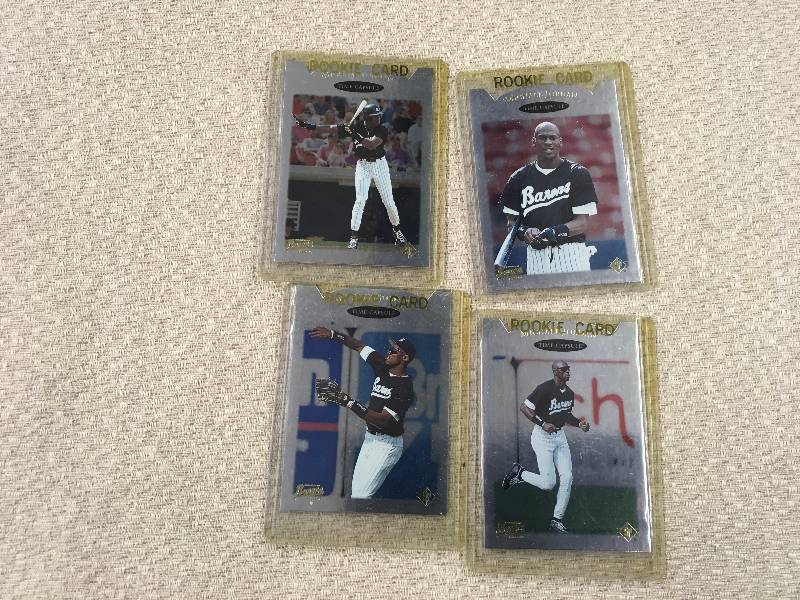 lot 338 image: Four Michael Jordan Rookie Cards