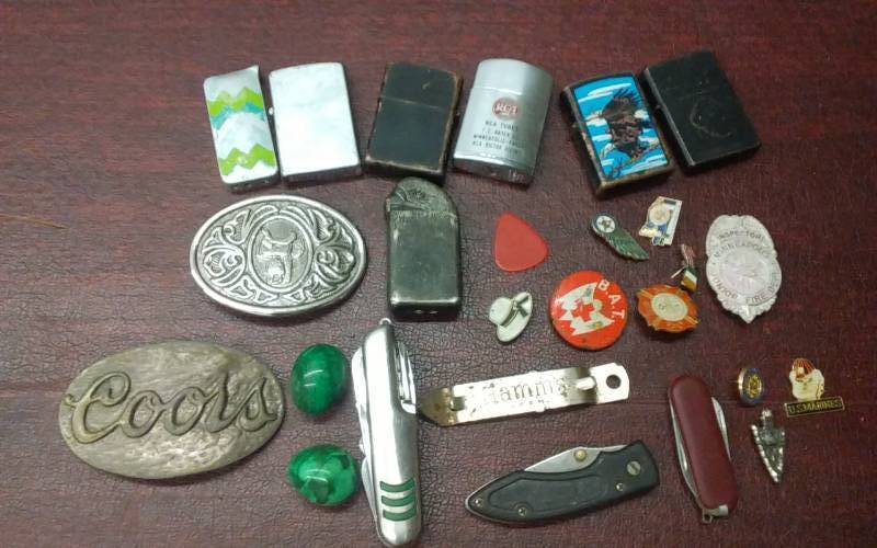 lot 44 image: Pocket Knives, Belt Buckles, Lighters, Pins