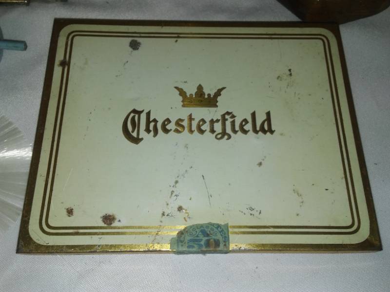 lot 24 image: Vintage Chesterfield metal box, ceramic angels, wood top, GOP elephant candy dish and more
