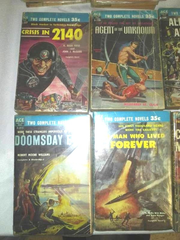 lot 63 image: Sci Fi Paper Backs Vintage, Jules Verne, Asimov, Dick, St. Clair