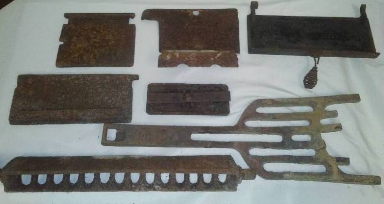 lot 65 image: 7 cast iron stove pieces Antique