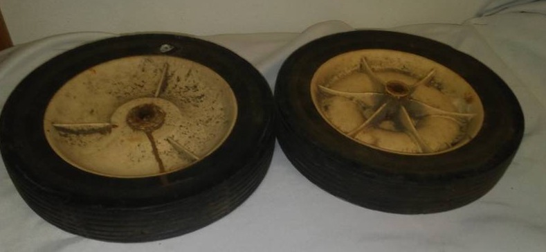 lot 110 image: 2 large rubber - plastic tire wheels,