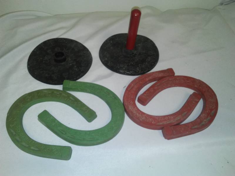 lot 112 image: Childrens rubber horseshoe set. Circa 1960s.