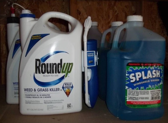 lot 75 image: Yard Chemicals and Washer Fluid