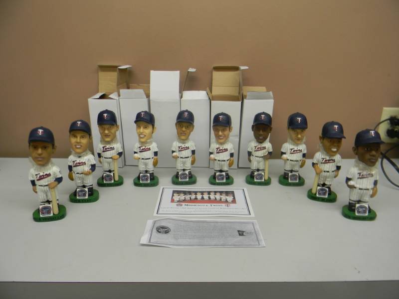 lot 32 image: MINNESOTA TWINS LIMITED EDITION 1965 AMERICAN LEAGUE CHAMPION BOBBLEHEAD DOLL SET AWESOME - RARE J. KAAT, B. ALLISON, Z. VERSALLES, E. BATTEY, H. KILLEBREW, T. OLIVA, J. PERRY, C. PASCUAL, JIM MUDCAT GRANT, F. QUILICI - SEE PICTURES