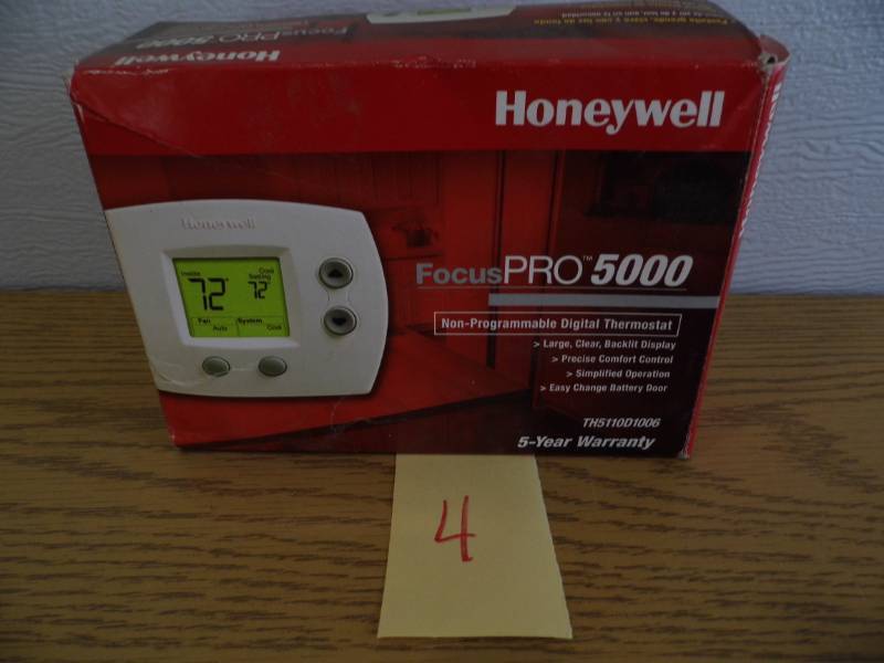 lot 4 image: Honeywell Thermostat