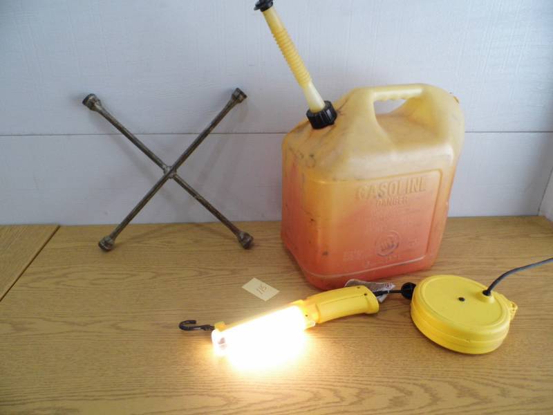 lot 115 image: Retractable Trouble Light - Gas Can - Tire Iron
