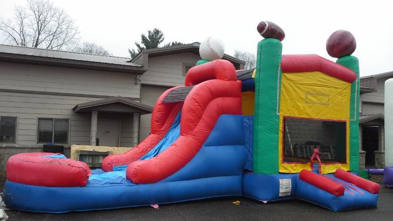lot 14 image: 15 X 28 Water Slide 4 in 1  Sports Combo