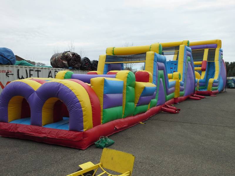 lot 2 image: 100 Ft Obstacle Course with 19 Ft Rock Climb Slide (Great Larger Event Piece)
