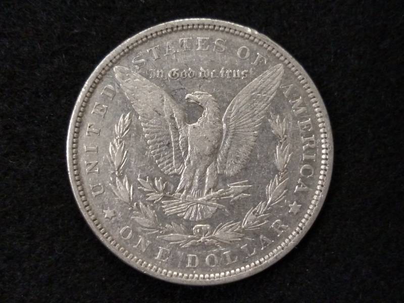 lot 5 image: 1879 Rev 79 Morgan Silver Dollar...