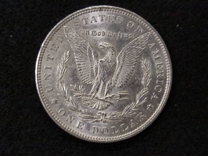 lot 15 image: 1890 Morgan Silver Dollar...