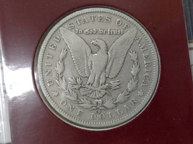 lot 17 image: 1891 CC Morgan Silver Dollar & Stam...