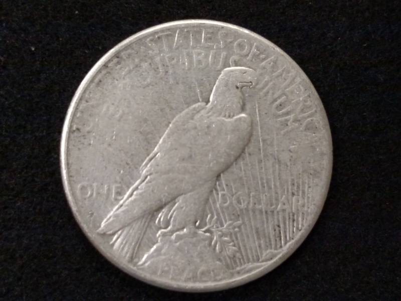 lot 54 image: 1925 S Peace Silver Dollar...