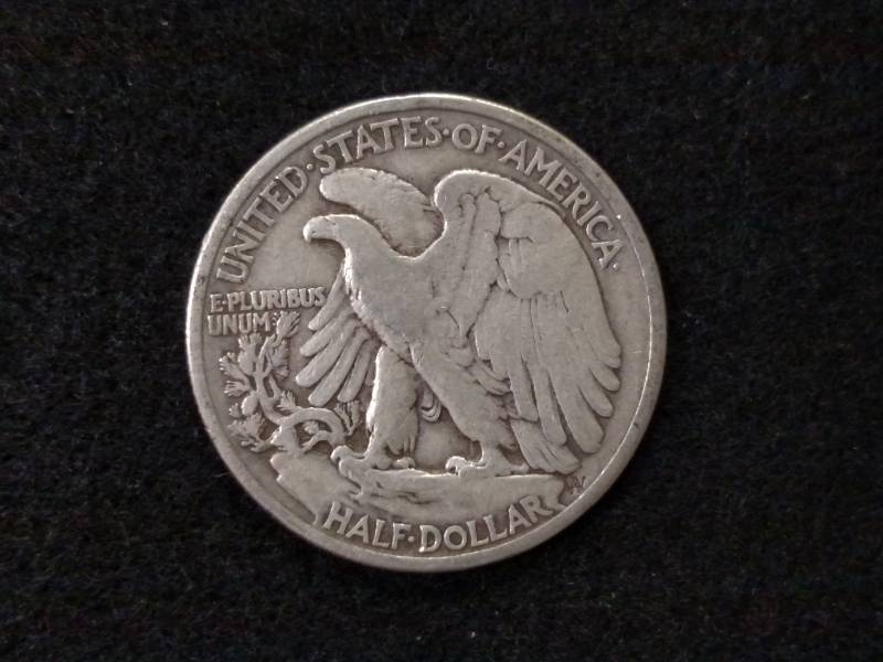 lot 59 image: 1935 Walking Liberty Silver Half Do...