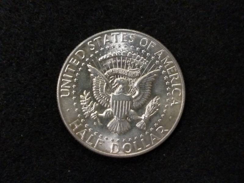 lot 100 image: 1964 D Kennedy Silver Half Dollar...