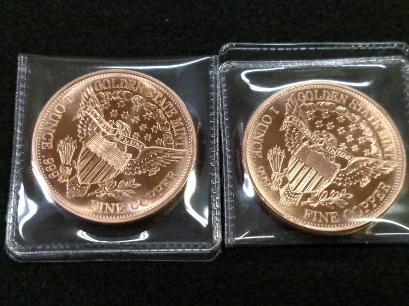 lot 123 image: (2) One Ounce .999 Copper Coins...