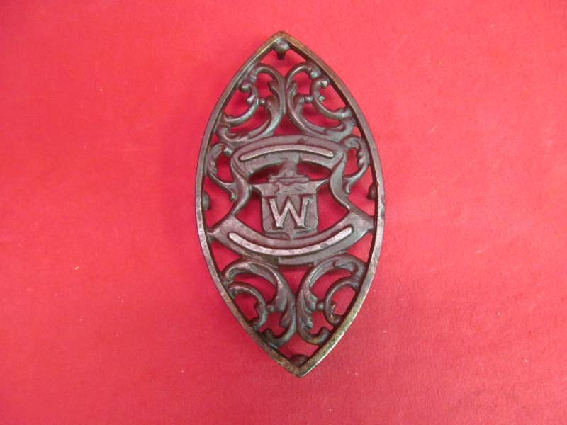 vintage iron trivet