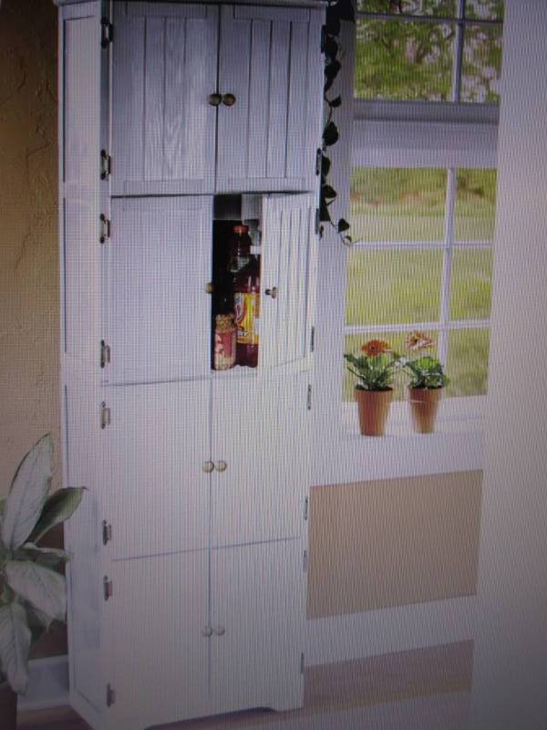 lot 15 image: 8 Door Wall Cabinet open box Retail...