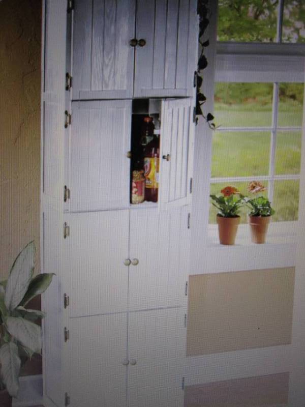 lot 55 image: 8 Door Wall Cabinet open box Retail...