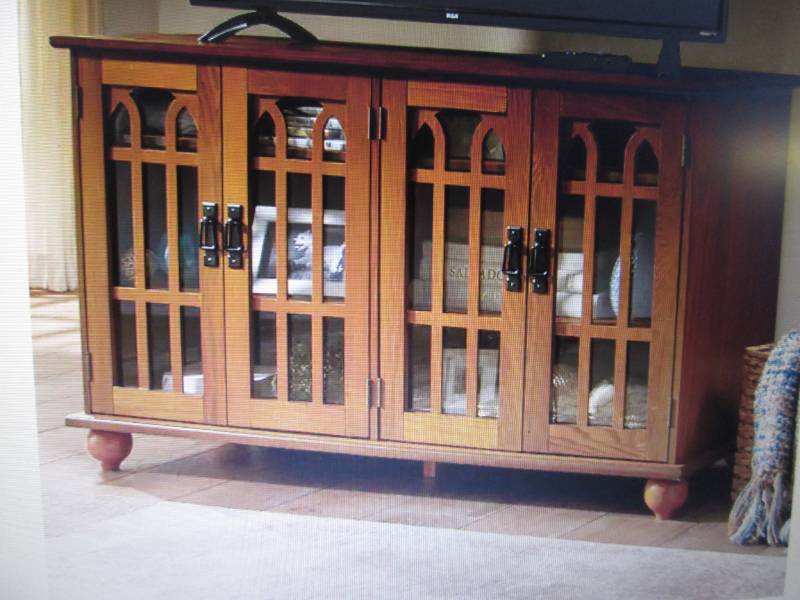 lot 83 image: Arched-Door Mission Style 4-Door TV...