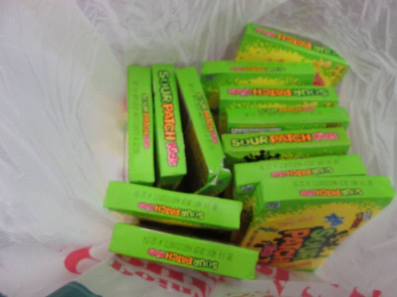 lot 332 image: 12- 3.5 oz Sour Patch Kids Candy...