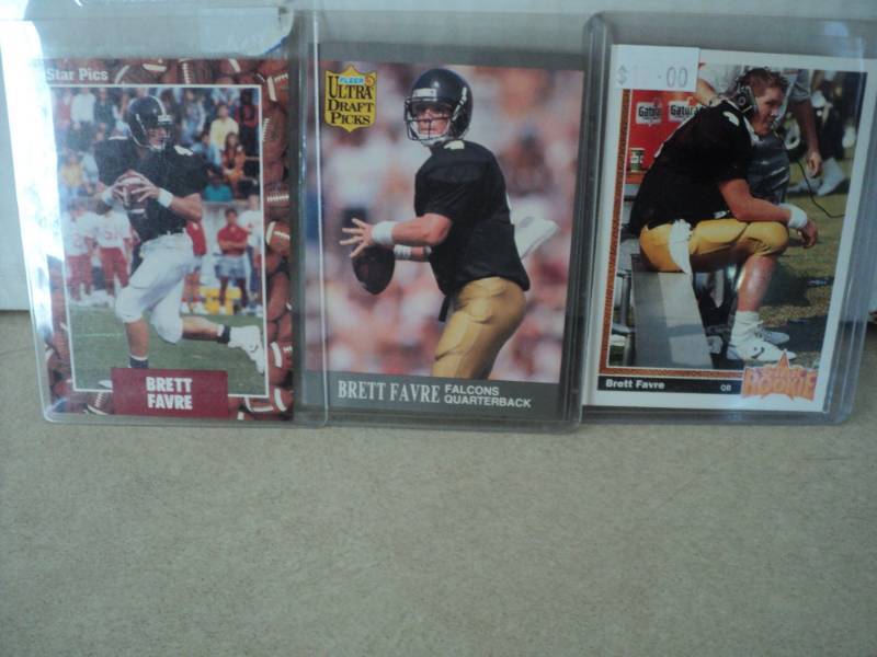 lot 9 image: 3 Brett Favre Rookie Cards...