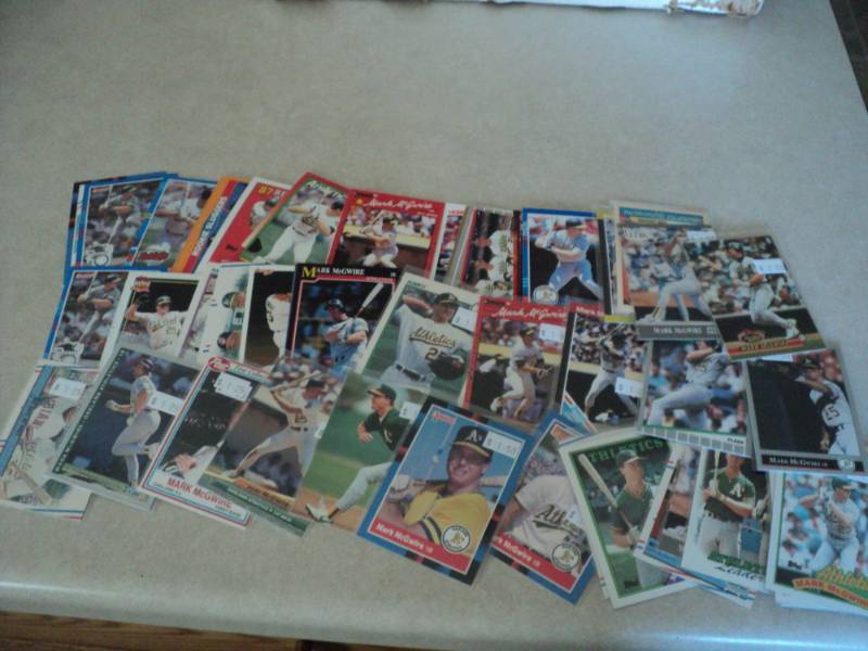 lot 22 image: 50 Mark McGwire Cards...
