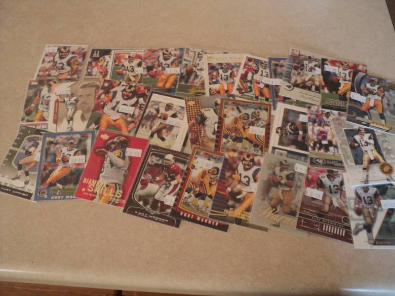 lot 24 image: 30 Kurt Warner Cards...