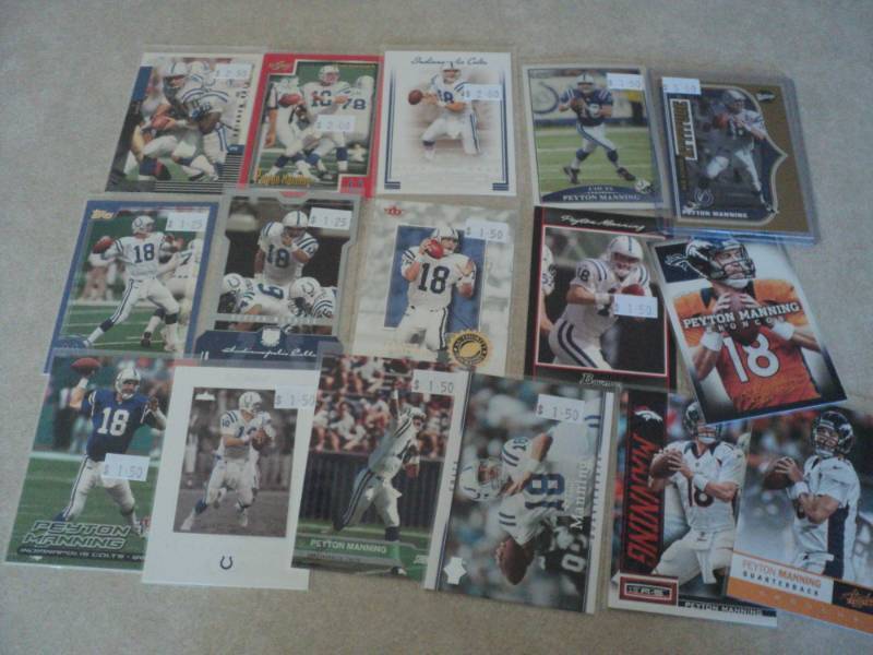 lot 25 image: Peyton Manning Cards...