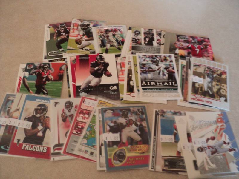 lot 64 image: 40 Michael Vick Cards...